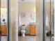 Clean bathroom with double sinks, a toilet and a shower at 4489 Strathmore Dr, Lake Wales, FL 33859