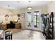 Light and airy entryway with office and seating at 4489 Strathmore Dr, Lake Wales, FL 33859