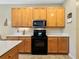 Well-equipped kitchen, featuring stainless steel appliances and ample counter space at 4489 Strathmore Dr, Lake Wales, FL 33859