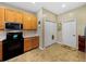 Efficient kitchen with stainless steel appliances and convenient pantry at 4489 Strathmore Dr, Lake Wales, FL 33859