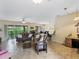 Spacious living room with reclining sofas and view to lanai at 4489 Strathmore Dr, Lake Wales, FL 33859