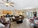 Open living room features recessed lighting, comfortable seating and views to kitchen at 4489 Strathmore Dr, Lake Wales, FL 33859