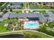 Aerial view of Lake Ashton community pool with a large pool and landscaping at 4489 Strathmore Dr, Lake Wales, FL 33859