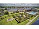 Resort-style pool and meticulously landscaped gardens at 4489 Strathmore Dr, Lake Wales, FL 33859
