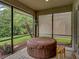 Screened patio with hot tub and access to backyard at 4489 Strathmore Dr, Lake Wales, FL 33859