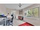 Home office with window, desk and shelving at 48 Nottingham Way, Haines City, FL 33844