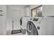Laundry room with Samsung washer and dryer at 48 Nottingham Way, Haines City, FL 33844