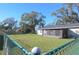 Spacious backyard with chain link fence at 5090 Misty Lake Dr, Mulberry, FL 33860