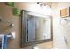 Bathroom with a large mirror, vanity, and shower at 5090 Misty Lake Dr, Mulberry, FL 33860