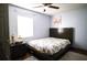 Bedroom with a double bed, nightstand, and closet at 5090 Misty Lake Dr, Mulberry, FL 33860