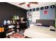 Bright bedroom with double bed, window, and storage at 5090 Misty Lake Dr, Mulberry, FL 33860