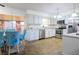 Bright kitchen, stainless steel appliances, and an adjacent dining area at 5090 Misty Lake Dr, Mulberry, FL 33860