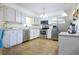Kitchen with stainless steel appliances and light cabinets at 5090 Misty Lake Dr, Mulberry, FL 33860