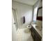 Bathroom with shower, toilet and vanity at 50989 Highway 27 # 8, Davenport, FL 33897