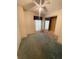 A bedroom with carpet, ceiling fan, and built-in drawers at 50989 Highway 27 # 8, Davenport, FL 33897