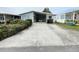 Mobile home with carport and paved driveway at 50989 Highway 27 # 8, Davenport, FL 33897