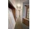 Long hallway with multiple doors and closet at 50989 Highway 27 # 8, Davenport, FL 33897