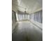 Bright screened porch with multiple windows at 50989 Highway 27 # 8, Davenport, FL 33897