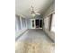 Spacious screened porch with ceiling fan at 50989 Highway 27 # 8, Davenport, FL 33897