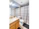 Clean bathroom with a shower/tub combo and wood vanity at 523 Brookeshire Dr, Davenport, FL 33837