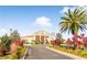 Community clubhouse with landscaping and palm trees at 523 Brookeshire Dr, Davenport, FL 33837