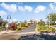 Community clubhouse entrance with landscaping and palm trees at 523 Brookeshire Dr, Davenport, FL 33837