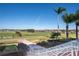Another scenic view of the golf course, showing the putting green and surrounding landscape at 523 Brookeshire Dr, Davenport, FL 33837