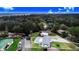 Aerial view of waterfront home with private pool and dock at 5524 Meander Dr, Lake Wales, FL 33898