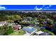 Aerial view of waterfront home with private pool and dock at 5524 Meander Dr, Lake Wales, FL 33898