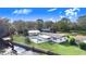 Aerial view of waterfront home with pool at 5524 Meander Dr, Lake Wales, FL 33898
