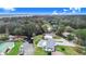 Aerial view of waterfront home with private pool and dock at 5524 Meander Dr, Lake Wales, FL 33898