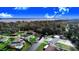 Aerial view of waterfront home with private pool and dock at 5524 Meander Dr, Lake Wales, FL 33898