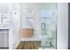 Clean bathroom, featuring a floating vanity and a glass shower at 5524 Meander Dr, Lake Wales, FL 33898