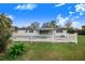 Back of house showcasing a pool and white fence at 5524 Meander Dr, Lake Wales, FL 33898
