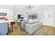 Open living area with modern furniture and kitchen island at 5524 Meander Dr, Lake Wales, FL 33898