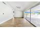Living room with sliding doors leading to a patio at 5524 Meander Dr, Lake Wales, FL 33898