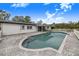 Relaxing kidney-shaped pool with pavers and steps at 5524 Meander Dr, Lake Wales, FL 33898