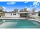 Inviting pool with patio and outdoor furniture at 5524 Meander Dr, Lake Wales, FL 33898