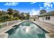 Refreshing kidney-shaped pool, surrounded by pavers at 5524 Meander Dr, Lake Wales, FL 33898