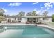 Inviting pool with patio and outdoor furniture at 5524 Meander Dr, Lake Wales, FL 33898