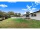 Home with backyard, pool and canal access at 5524 Meander Dr, Lake Wales, FL 33898