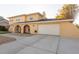 Two-story home with attached garage and welcoming entryway at 808 Lake Elbert Ct, Winter Haven, FL 33881