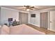 Spacious bedroom with queen bed, hardwood floors, and lots of natural light at 86 Winter Ridge Rd # 86, Winter Haven, FL 33881