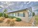 Landscaped community building exterior at 86 Winter Ridge Rd # 86, Winter Haven, FL 33881
