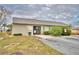 Community building with parking and landscaped grounds at 86 Winter Ridge Rd # 86, Winter Haven, FL 33881