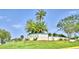 Entrance to Winter Ridge community with lush landscaping at 86 Winter Ridge Rd # 86, Winter Haven, FL 33881