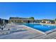 Refreshing community pool with surrounding patio at 86 Winter Ridge Rd # 86, Winter Haven, FL 33881