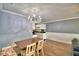 Dining area with floral bench seating at 86 Winter Ridge Rd # 86, Winter Haven, FL 33881