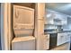 Stackable washer and dryer in a convenient laundry closet at 86 Winter Ridge Rd # 86, Winter Haven, FL 33881