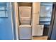 Stackable washer and dryer in a closet, near kitchen at 86 Winter Ridge Rd # 86, Winter Haven, FL 33881